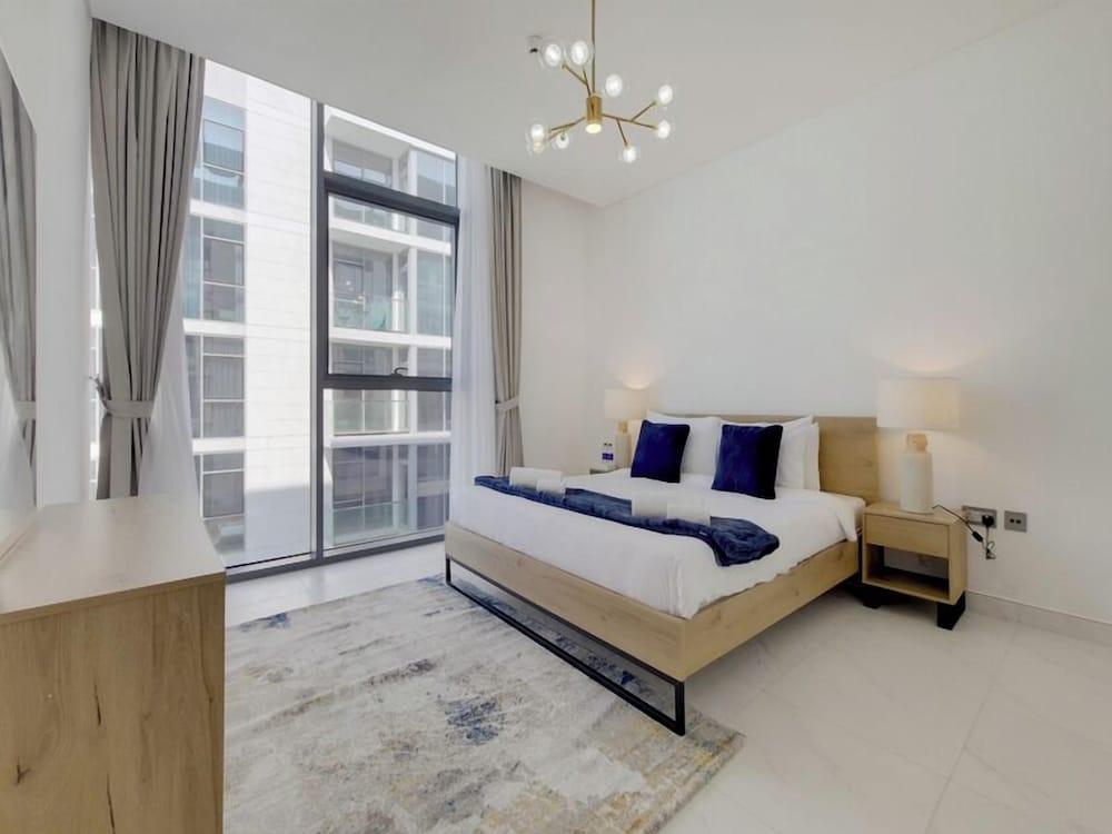 PVH | 1BR Lagoon View District One Residences - Tap to explore photos
