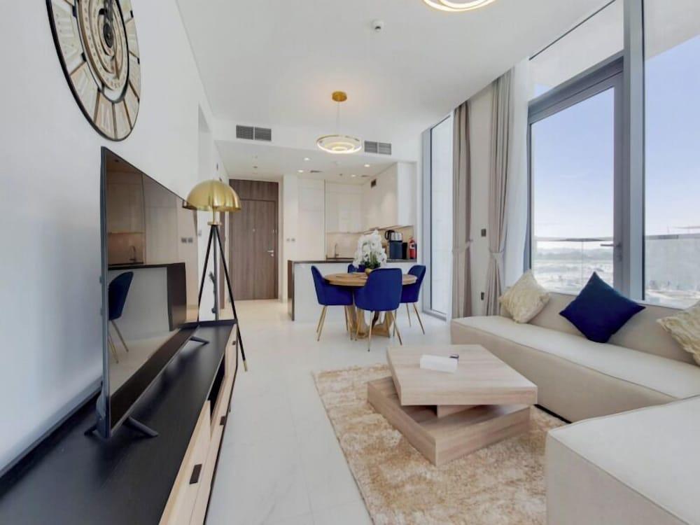 PVH | 1BR Lagoon View District One Residences - Tap to explore photos