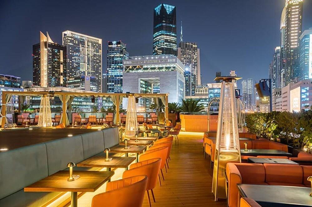 Silkhaus Modern Balcony Over Difc Studio Pool - Tap to explore photos