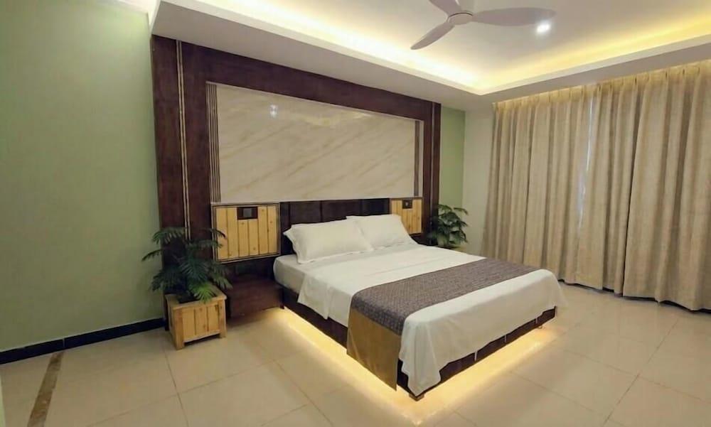 Blue Haven Retreat Room Type - Deluxe Triple Room