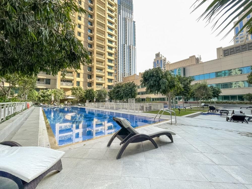 Upscale 2BR With Breathtaking Burj Views - Tap to explore photos