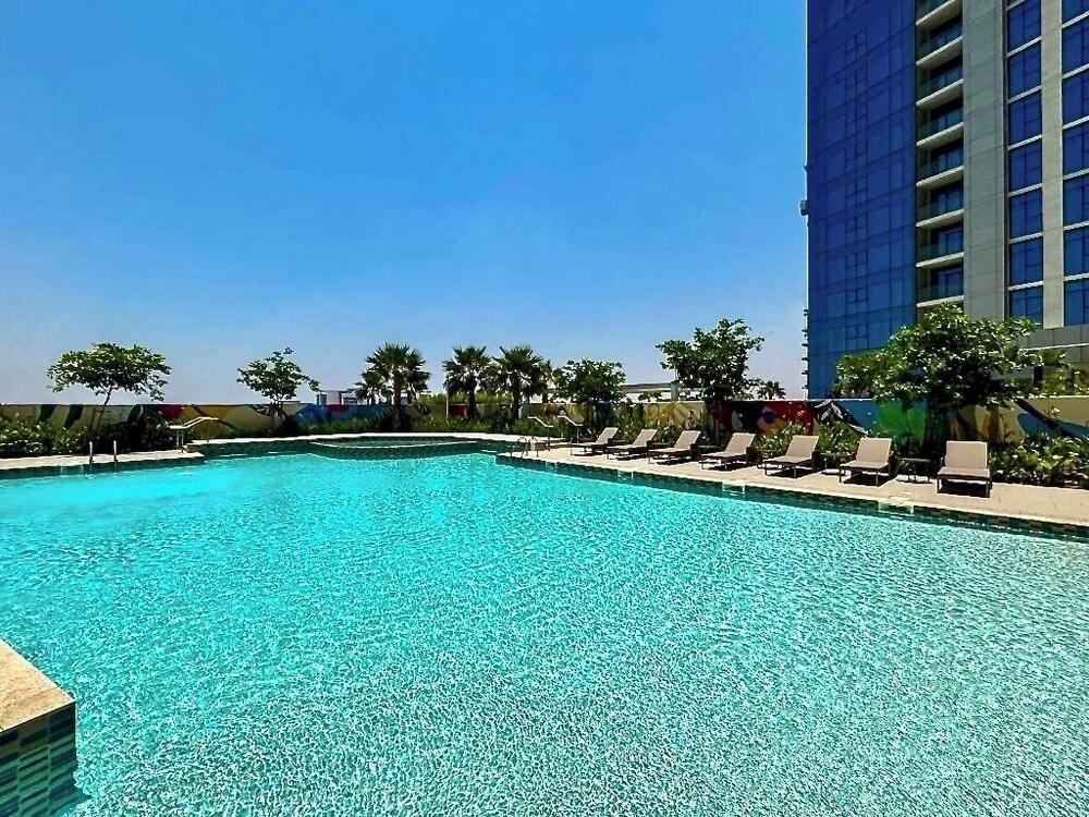 Lux BnB Aykon Tower Skyline Views - Tap to explore photos