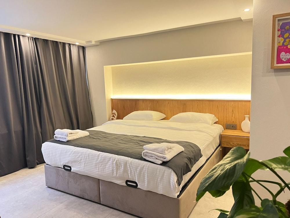 Khalkedon Suites - Tap to explore photos
