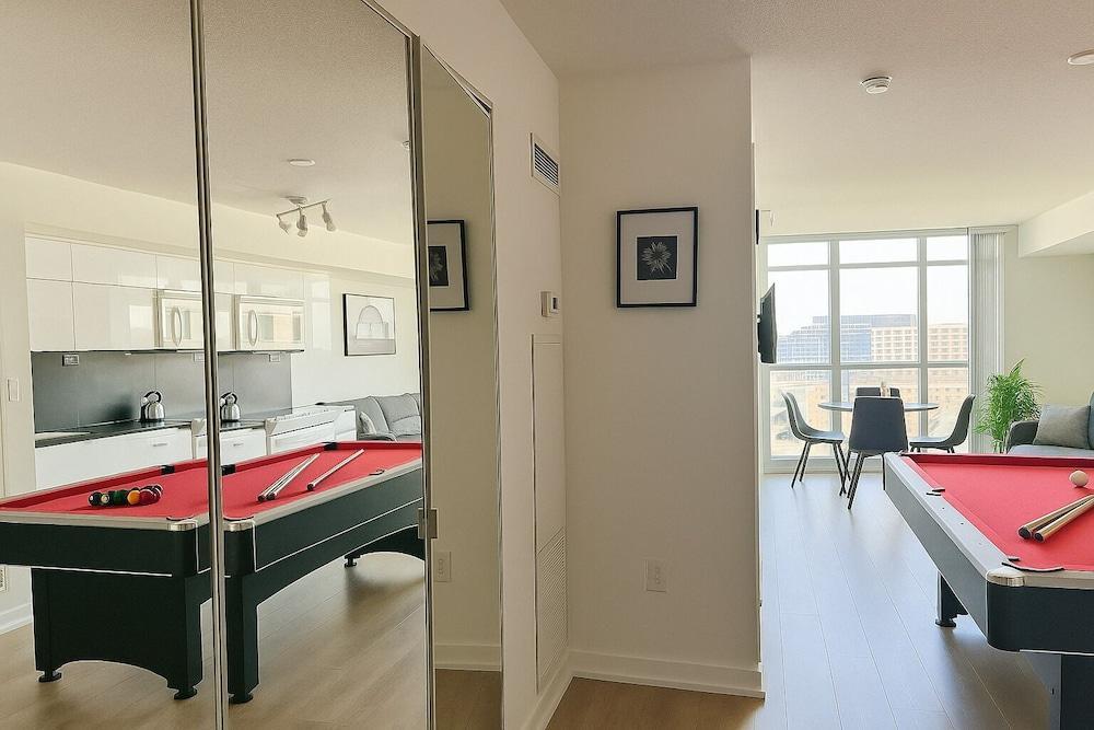 HostlyStays Luxury Suites - Tap to explore photos