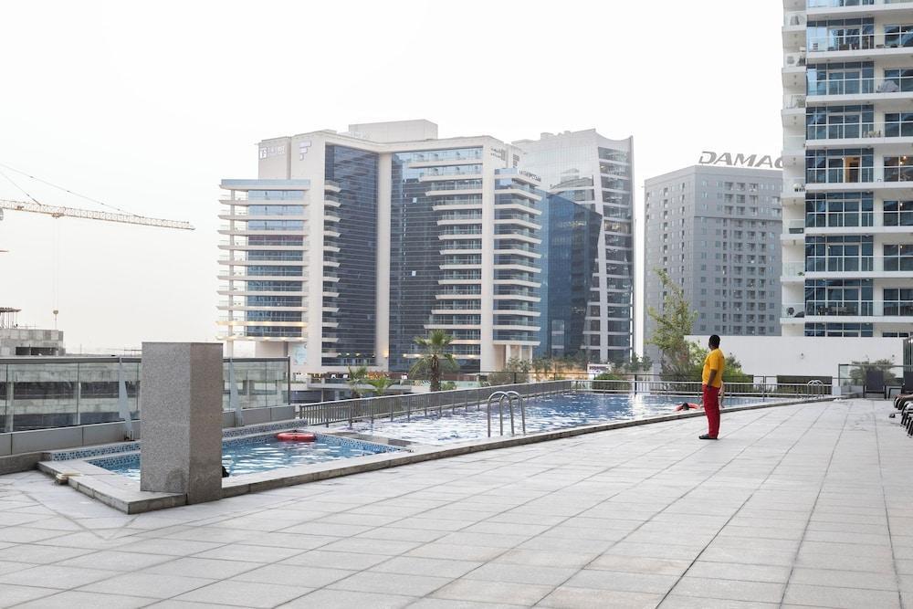 Stylish 2BR Business Bay Pool Access - Tap to explore photos