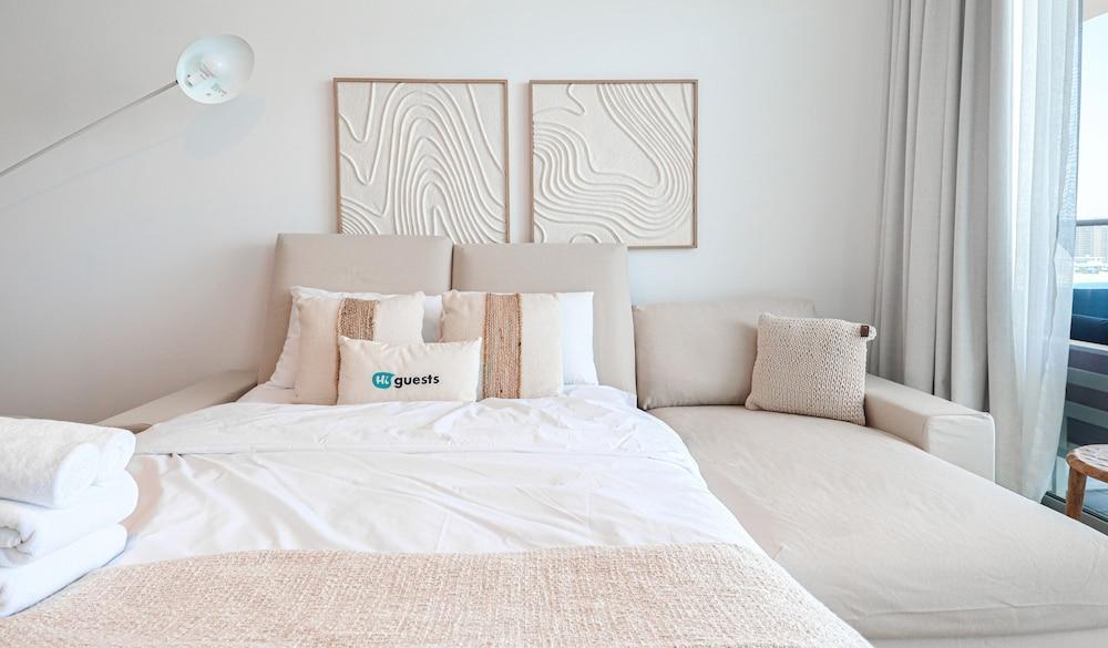 HiGuests - Azure Residences - Tap to explore photos