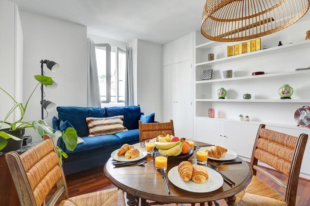 Stylish 1BR in Le Marais District - Tap to explore photos