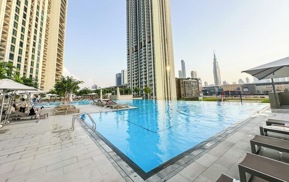 Burj Khalifa View - 2 BR - PS5 - Pool - Tap to explore photos