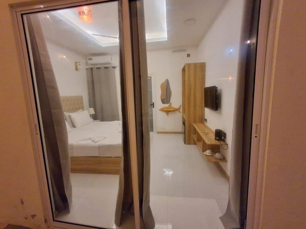 Alsha Inn Dhiffushi - Tap to explore photos
