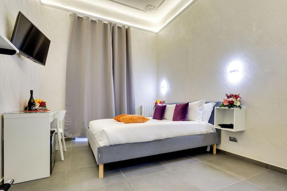 Rome Jubilee Guesthouse - Tap to explore photos