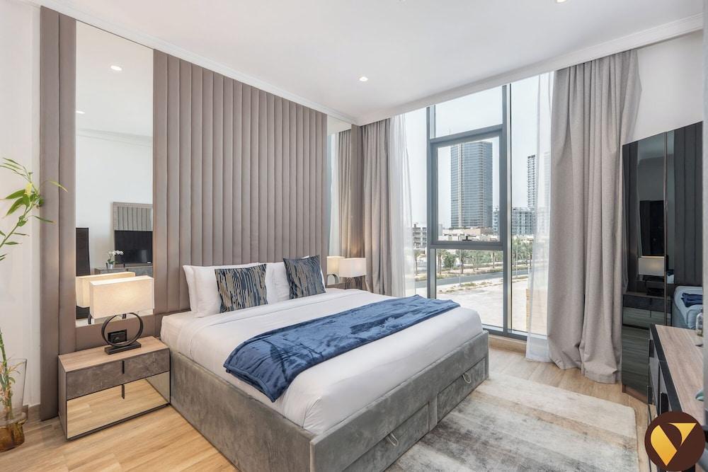 Vogue | Chaimaa Avenue JVC near Circle Mall Room Type - Luxury Apartment, Balcony, City View