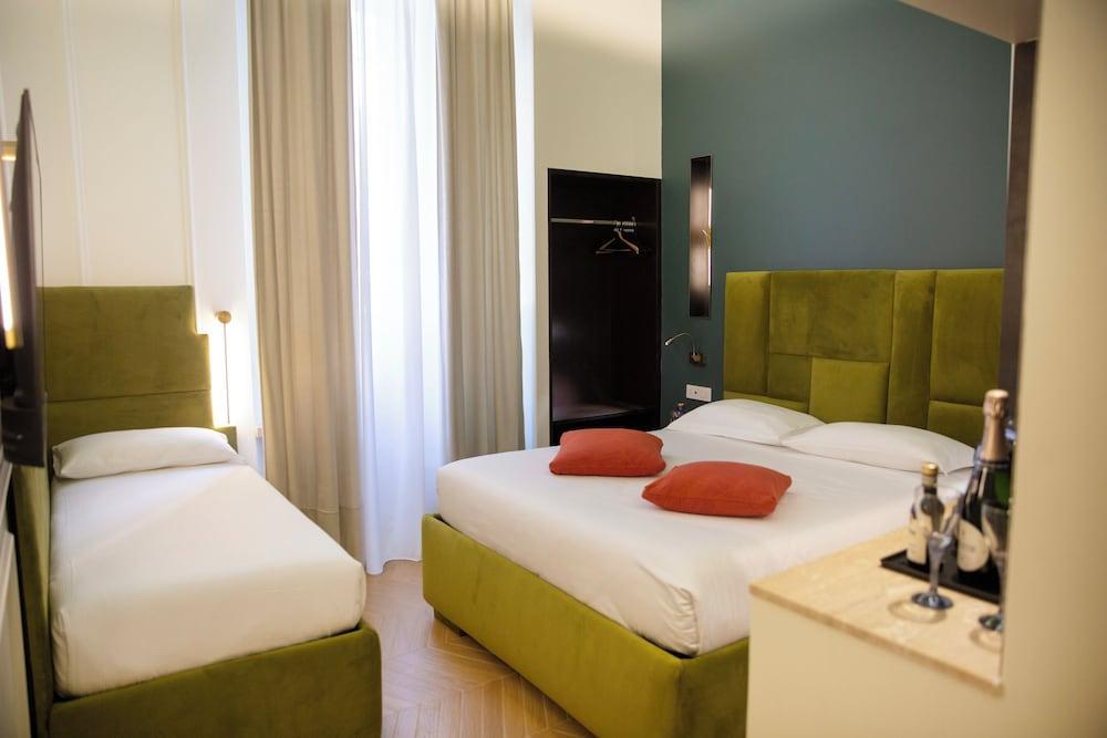 Unicum Trastevere Suites Room Type - Signature Triple Room