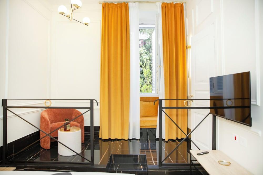 Unicum Trastevere Suites - Tap to explore photos
