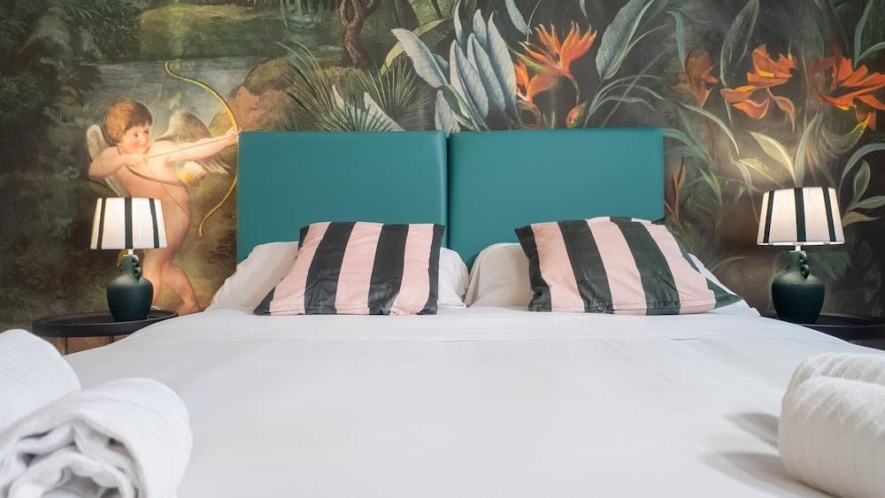 Popolo Guest Rooms Villa Borghese - Tap to explore photos