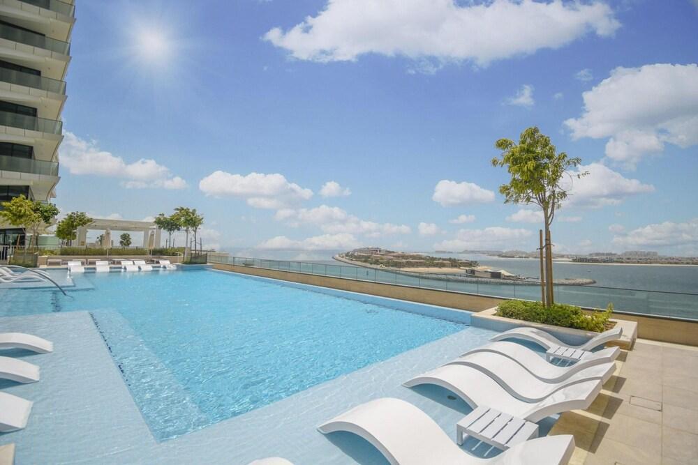 Luxury Sea View Living on Emaar Beachfront - Tap to explore photos