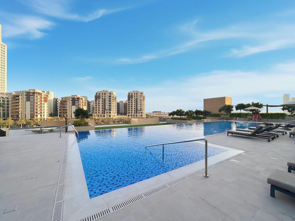 Serene 1BR Escape with Burj Khalifa View - Tap to explore photos