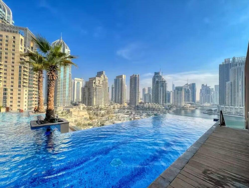 Marina Gate Pool view with balcony Beach - Tap to explore photos
