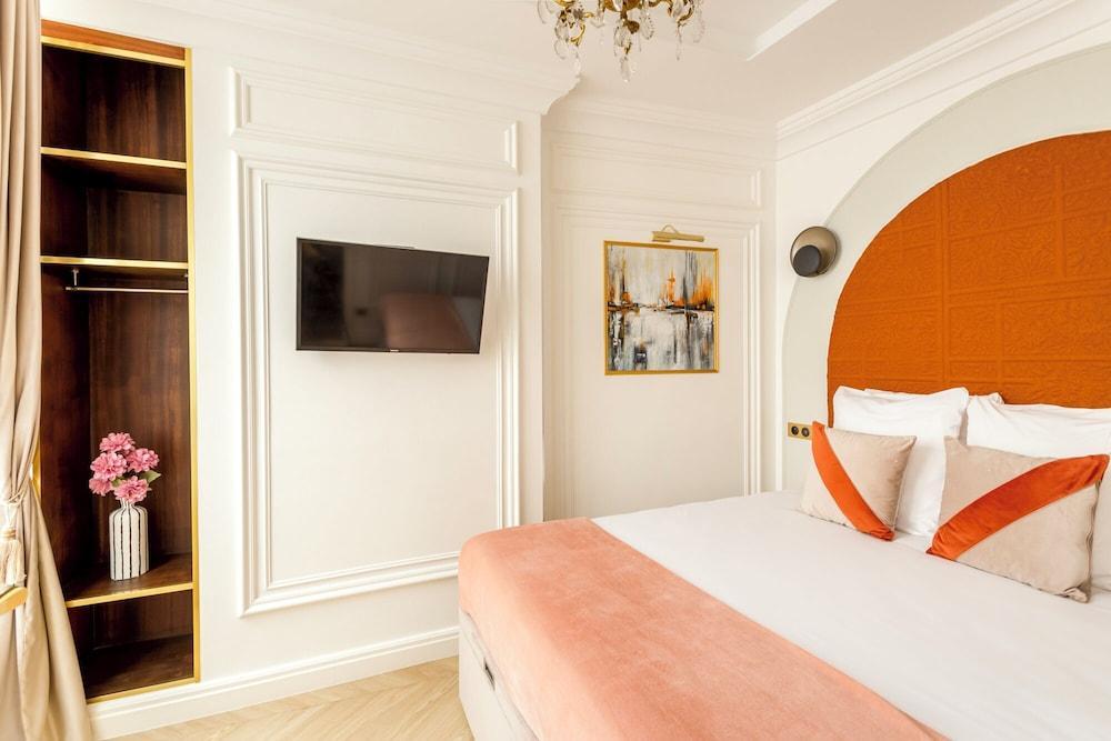 Merveil Luxury Suite - Louvre Rousseau - Tap to explore photos