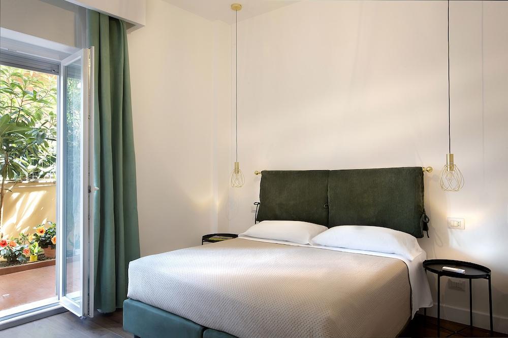 CHARME HOLIDAYS PUCCINI Room Type - Luxury Triple Room, Patio, Garden View CHARME HOLIDAYS PUCCINI Room Type - Luxury Triple Room, Patio, Garden View