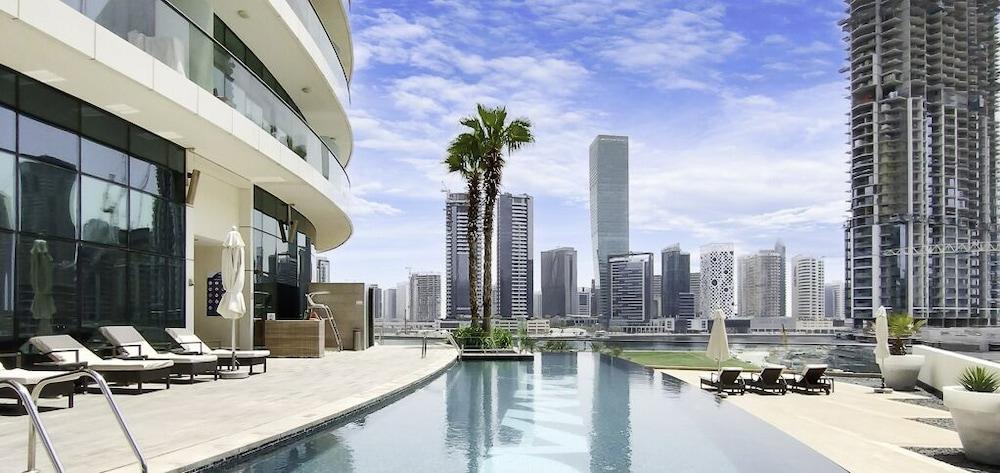LUX The Bays Edge Canal View Suite - Tap to explore photos