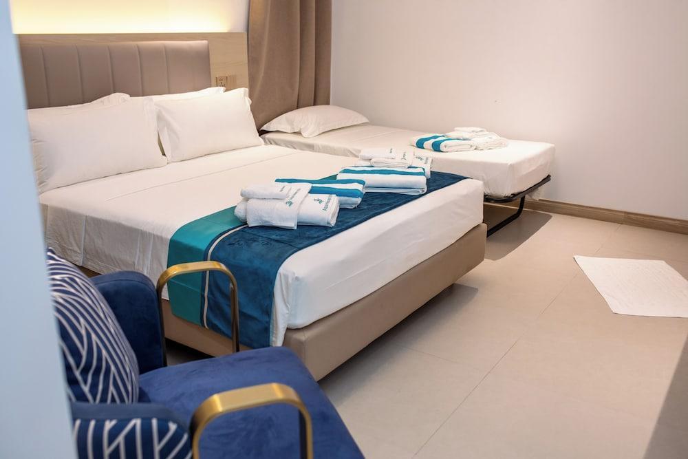 Aqua Heaven Inn Room Type - Deluxe Triple Room
