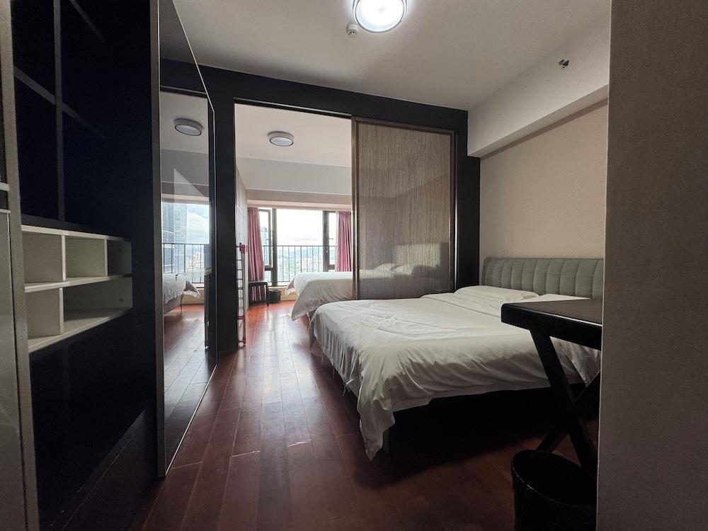 Linjiang Shangpin Apartment - Tap to explore photos