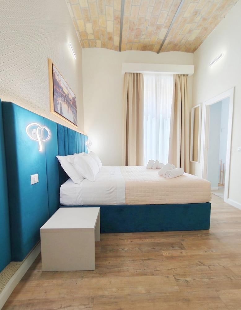 Nicole Suite Room Type - Deluxe Triple Room, City View