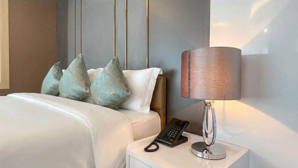 Enrich Grand Hotel - Tap to explore photos