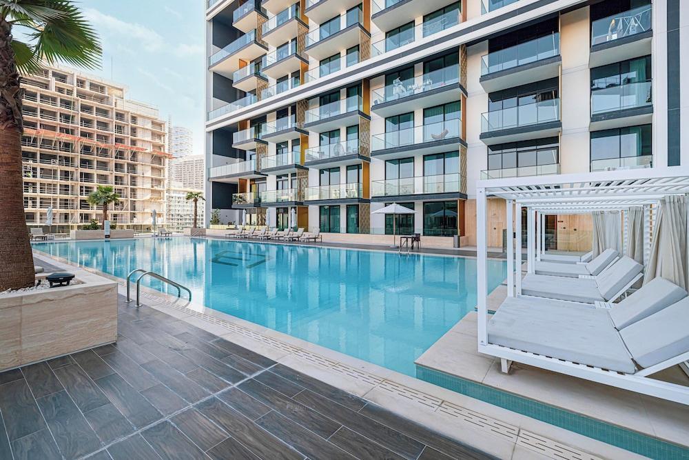 Binghatti Suites by Hostiva - City View - Tap to explore photos