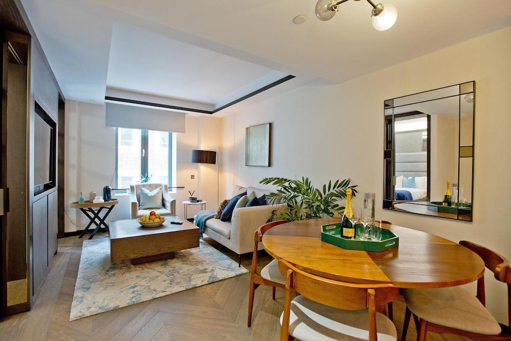 1-bed Executive Apt 102 - Tap to explore photos