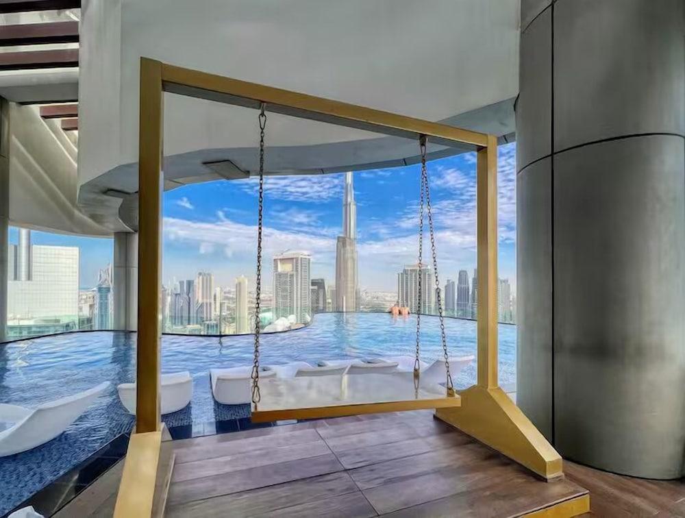 Spectacular Burj View from Infinity Pool - Tap to explore photos