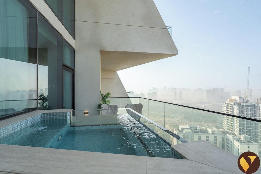 Vogue | Binghatti Phantom JVC with Private Pool - Tap to explore photos