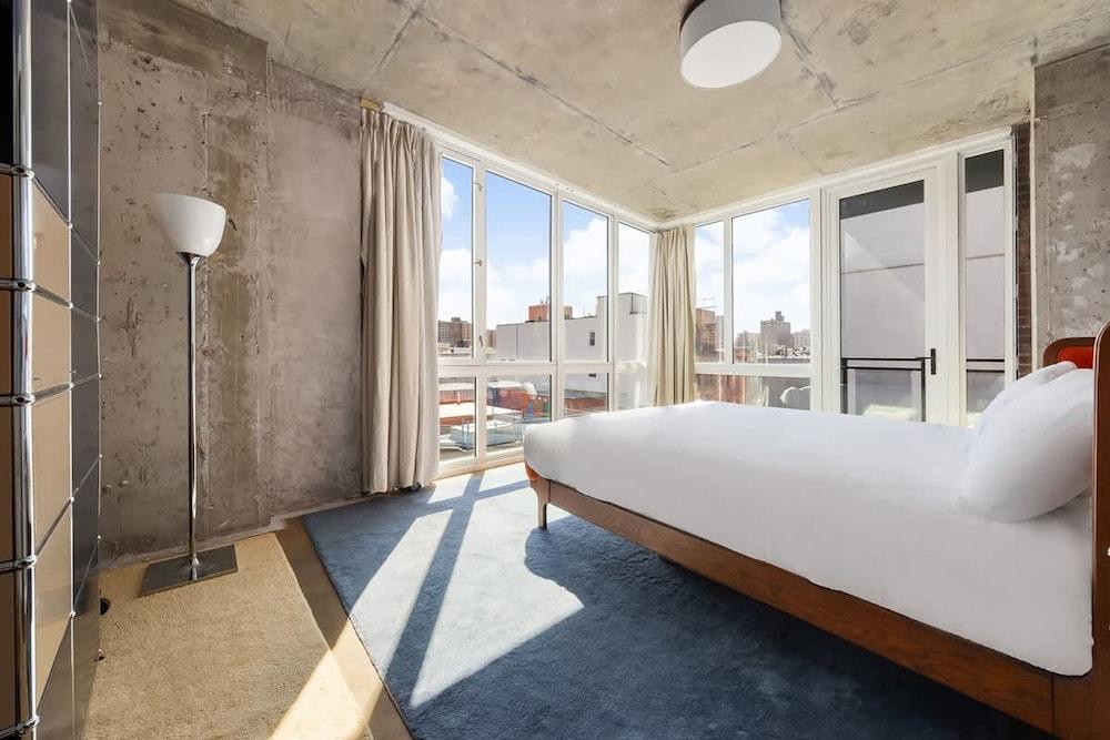 Houston by Rove Travel Patio Shared Rooftop - Tap to explore photos