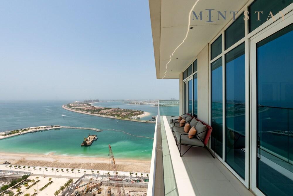 Elegant 2BR Emaar Beachfront Retreat - Tap to explore photos