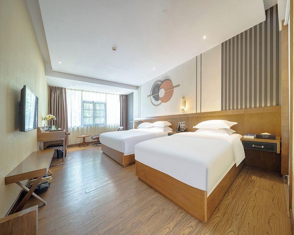 ELITE James Joyce Coffetel Guangzhou Room Type - Luxury Twin Room