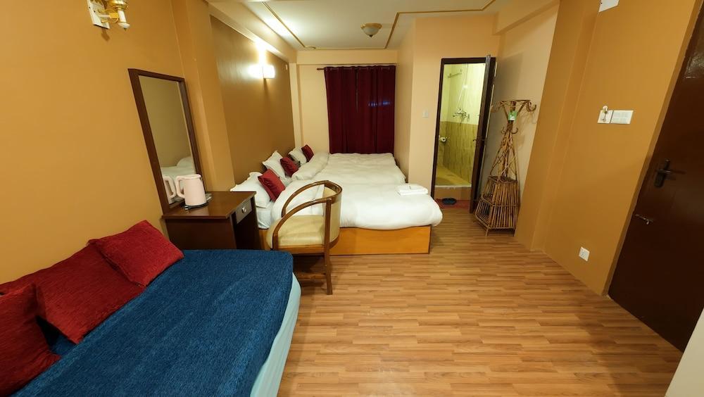 Hotel Triratna - Tap to explore photos