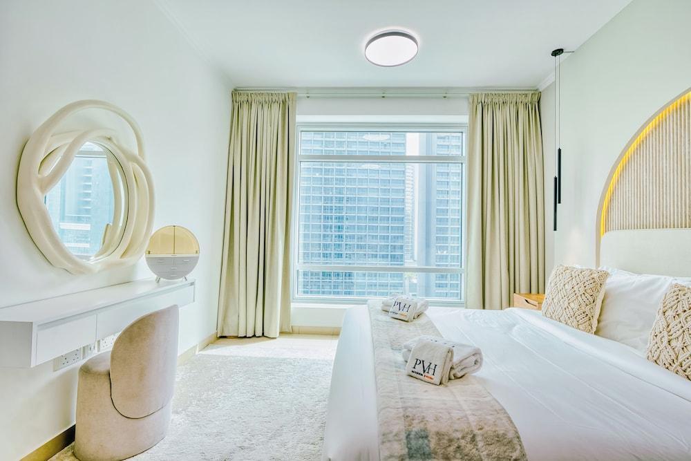 PVH - Inviting 1BR - Burj Views - Tap to explore photos