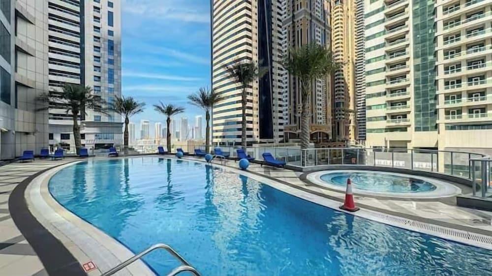 Vogue | Torch Tower near Dubai Marina Mall | JBR - Tap to explore photos