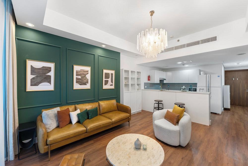Chic 1BR Canal View at Waves Tower - Tap to explore photos