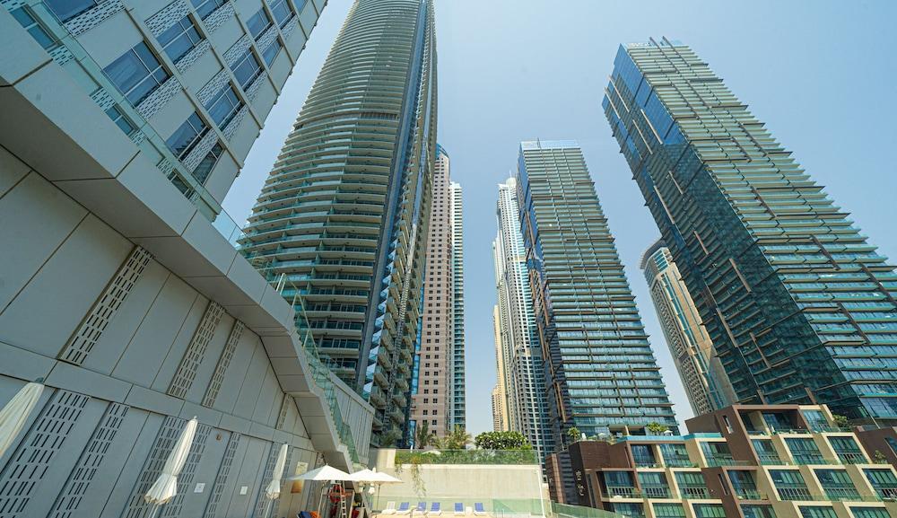 Cayan Escape Lavish 1BR with Sea View - Tap to explore photos