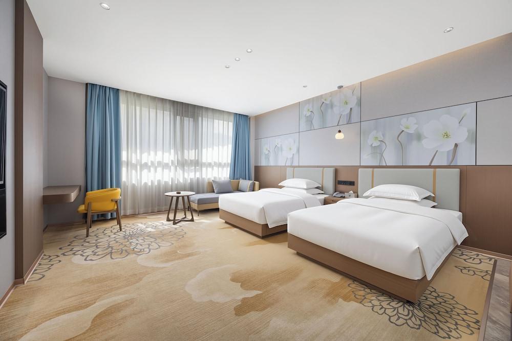 Meihao Exquisite Hotel - Tap to explore photos