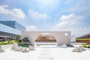 Wanxin R Hotel Shanghai Chongming Wanda Plaza Branch - Tap to explore photos