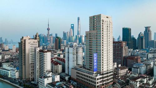 Jinglai Hotel Shanghai Nanjing East Road Branch - Tap to explore photos
