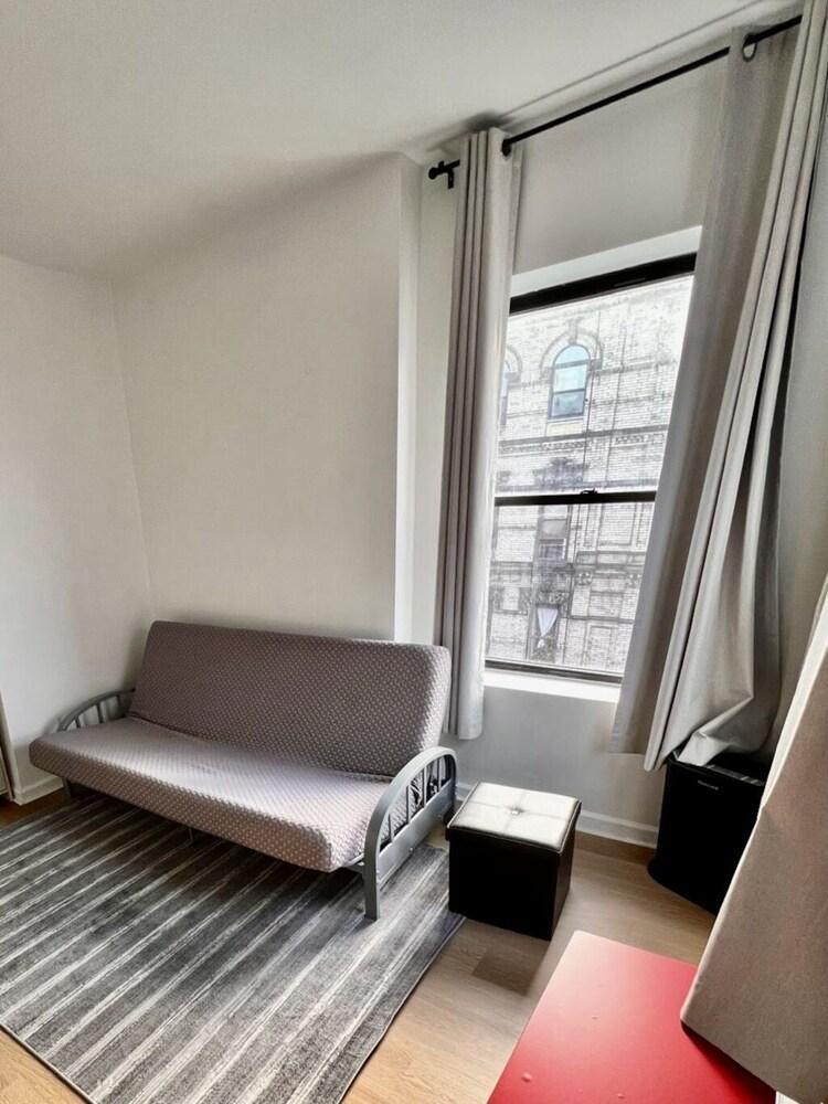 Cozy Apartment with Big Windows on Orchard St. - Tap to explore photos