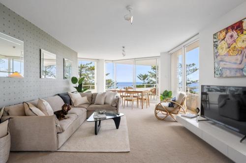 Best Beachfront Location In Manly w Stunning Views - Tap to explore photos