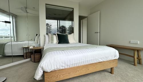 Best Beachfront Location In Manly w Stunning Views - Tap to explore photos