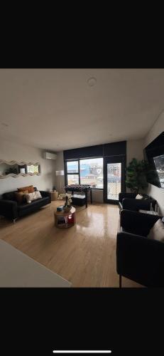 Beachfront Apartment in Brighton - Tap to explore photos