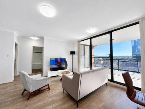 Modern 2 Bedroom Apartment with Parking Central Parramatta - Tap to explore photos