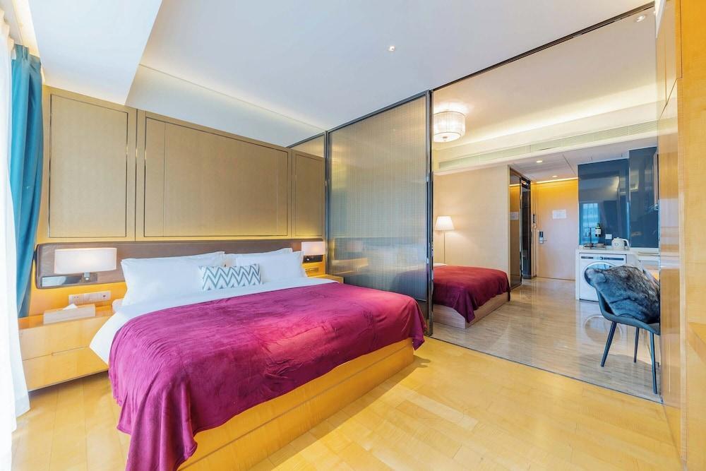 VanHao Serviced Apartment-Zhujiang Newtown - Tap to explore photos