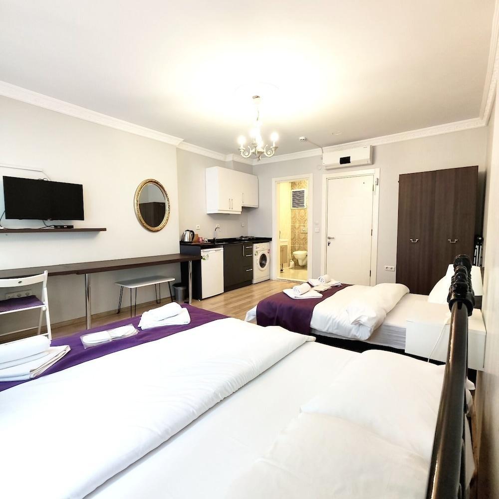Frame Luxury Apartments Room Type - Family Quadruple Room